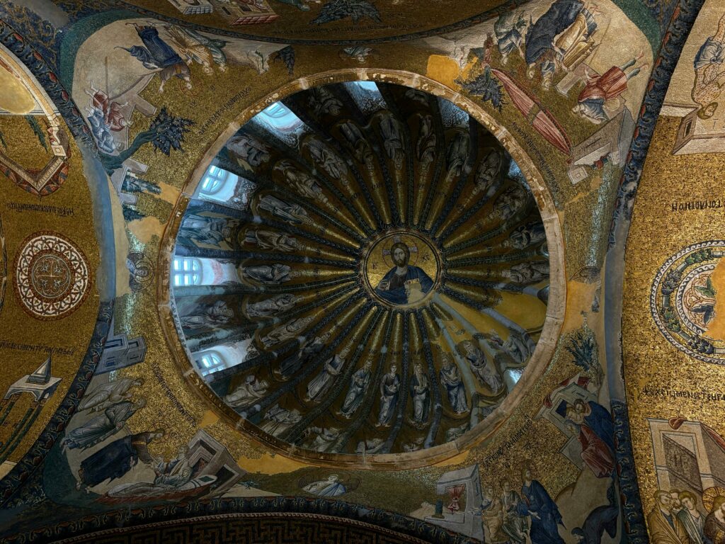 Stunning view of a Byzantine dome adorned with vibrant religious mosaics.
